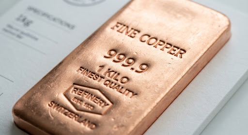Macro detail of the stamped purity mark on the 1kg copper bar